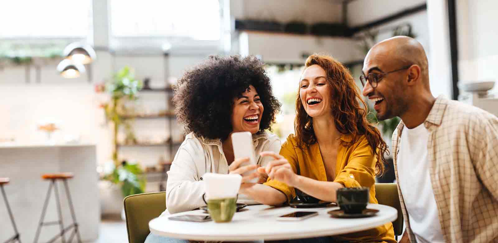 three friends laughing